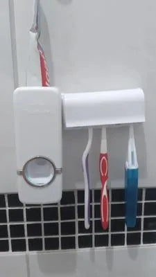 Toothpaste Dispenser And Brush Holder